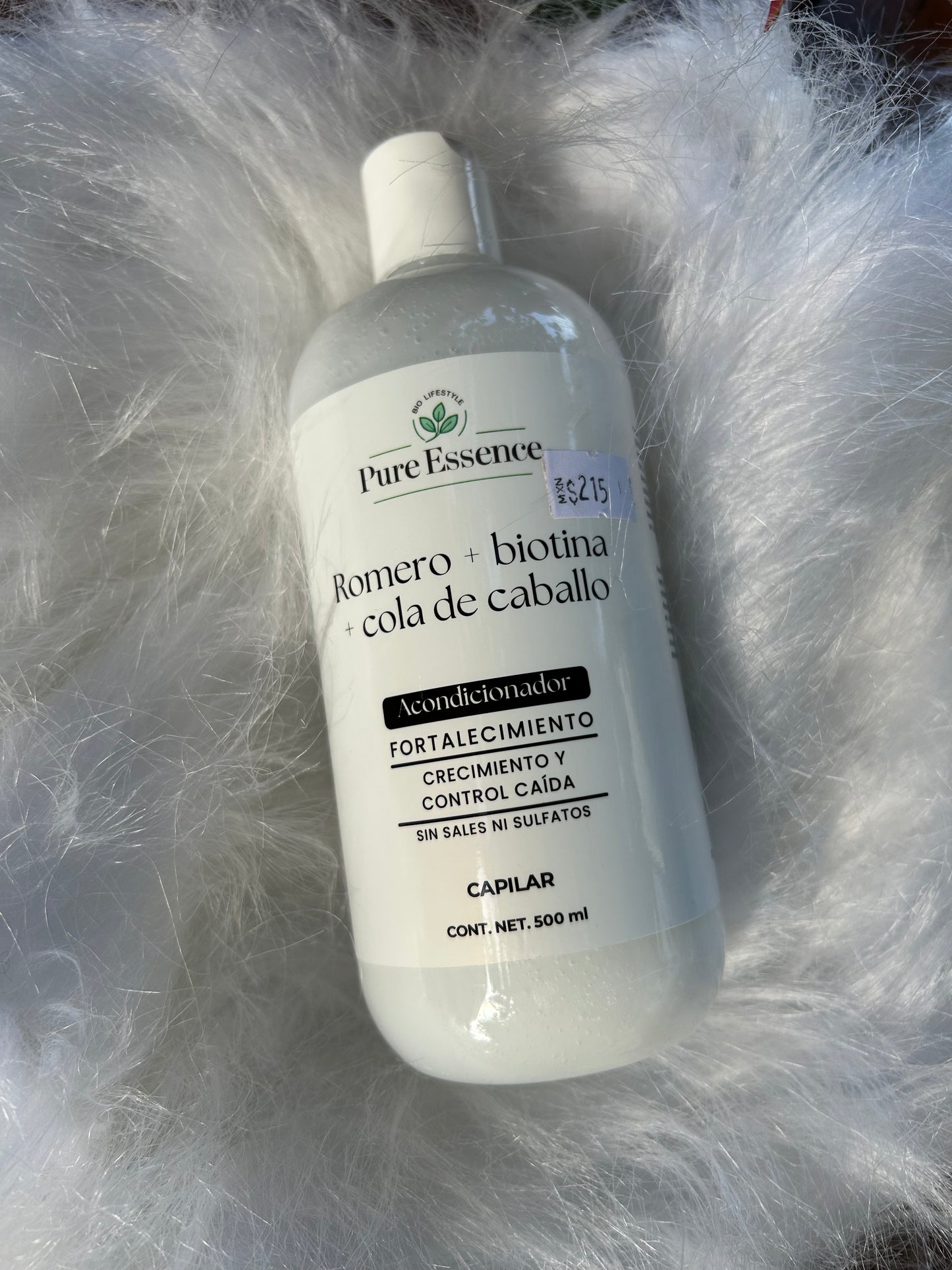 Botella de shampoo fortalecedor Pure Essence, línea romero y biotina